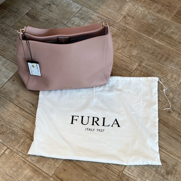 Furla Handbags - Furla Grace medium bag in a light pink. Comes with Dustbag. NWT
